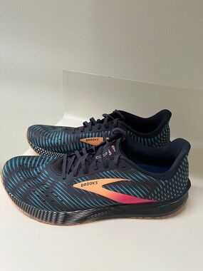 Brooks Black Running Shoes with Teal Pattern and Coral Accent